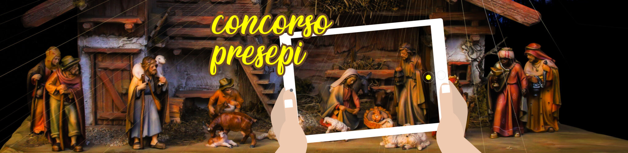 Mani con tablet che scattano foto al presepio